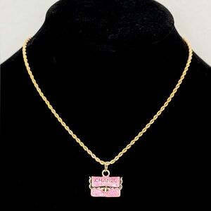 Pink purse charm on Gold Necklace